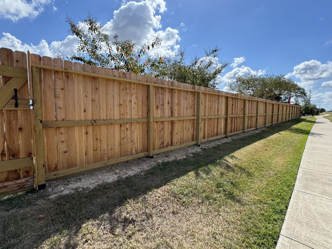 Full Western red cedar privacy fence run with rot board